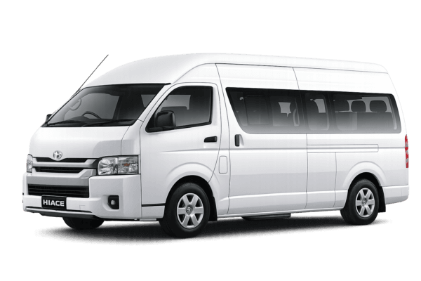 Toyota Hiace Commuter Luxury putih tampak serong depan dan samping untuk layanan sewa Hiace Luxury Bandung dengan driver profesional